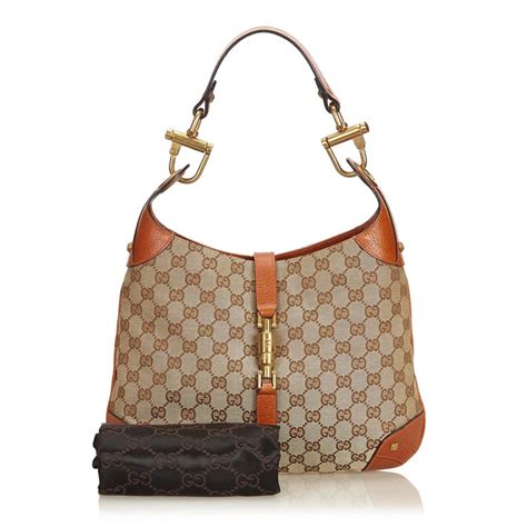 gucci brown leather hobo bag.